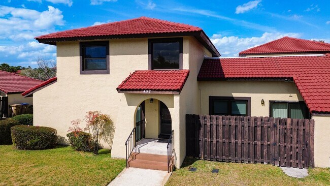 Building Photo - Spanish-Style 3 Bedroom, 2.5 Bath Mediterranean Rooftop Townhouse – Basic Cable & Wi-Fi Included!