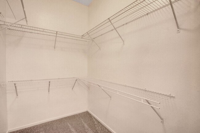 Building Photo - FIRST FLOOR CONDO IN GATED COMMUNITY W/ SINGLE CAR GARAGE