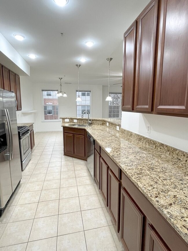 Building Photo - Sizable End Unit Townhome in Wheaton w/ 2 Car Garage!