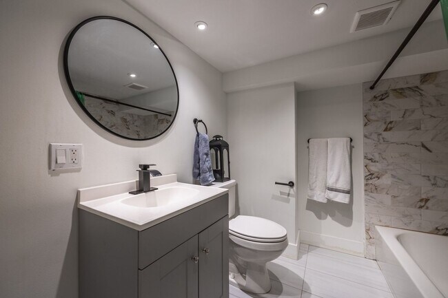 Building Photo - Charming 1935 Tudor in 15th & 15th – Renovated with Modern Luxury
