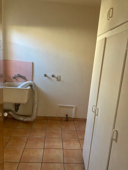 Laundry Room with Sink and Storage - 1242 S Point View St