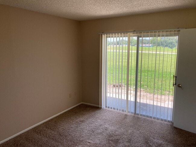 Building Photo - Downstairs 2/2 Country Club Village Condo ...