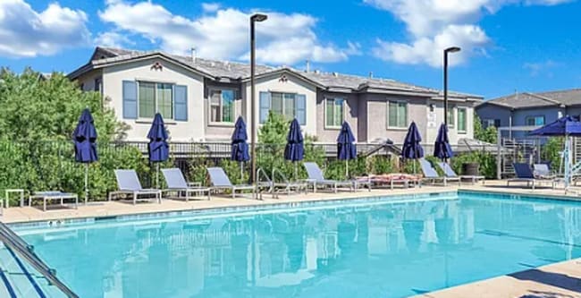 Building Photo - Beautiful townhome features a bright, open-concept layout