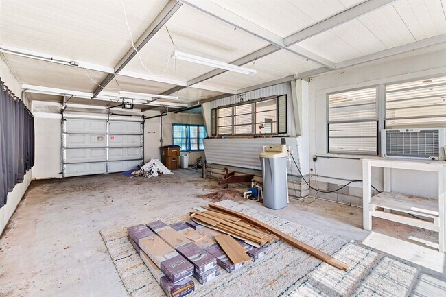 Building Photo - Charming 2BR/2BA Waterfront Home for Rent with Canal Access & Two Garages