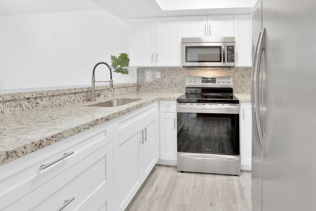 Building Photo - 8999 SW 123rd Ct