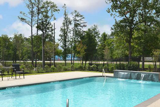 Beautiful pool with waterfall - Woodside Manor