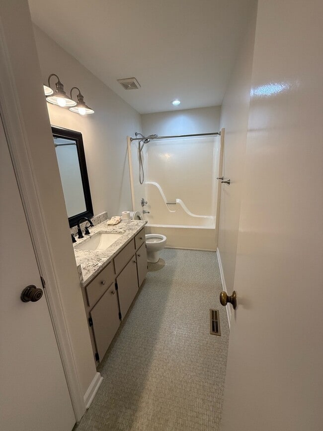 Building Photo - Spacious ranch, fenced yard, 2 car garage, large basement, near Wake Tech