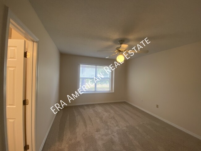 Building Photo - 7468 Woodmont Rd