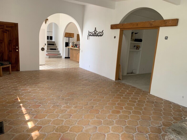 View from entertaining room into dining area and living room - 10458 Pearson Pl