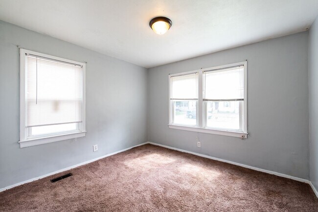 Building Photo - Charming 2-Bedroom Home with Bonus Attic S...