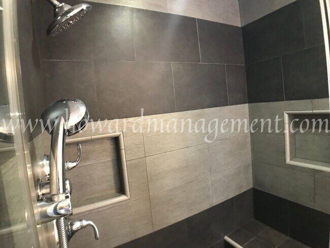 Building Photo - Beautiful lower condo with large patio in Tara Hills, a resort style living complex!