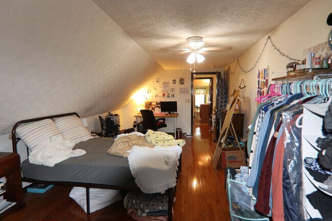 View 2 of 3rd floor bedroom with added window A/C unit - 372 E Oakland Ave