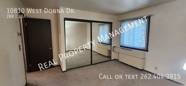 Building Photo - Two Bedroom Upper Condo w/ Utilities Included