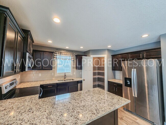 Building Photo - A Must See 4 Bedroom 3.5 Baths in Norwalk with a 3 Car Garage!!!