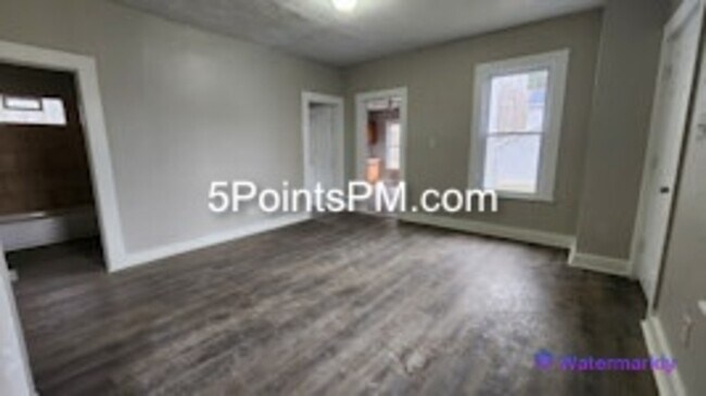 Building Photo - 9804 Miles Ave