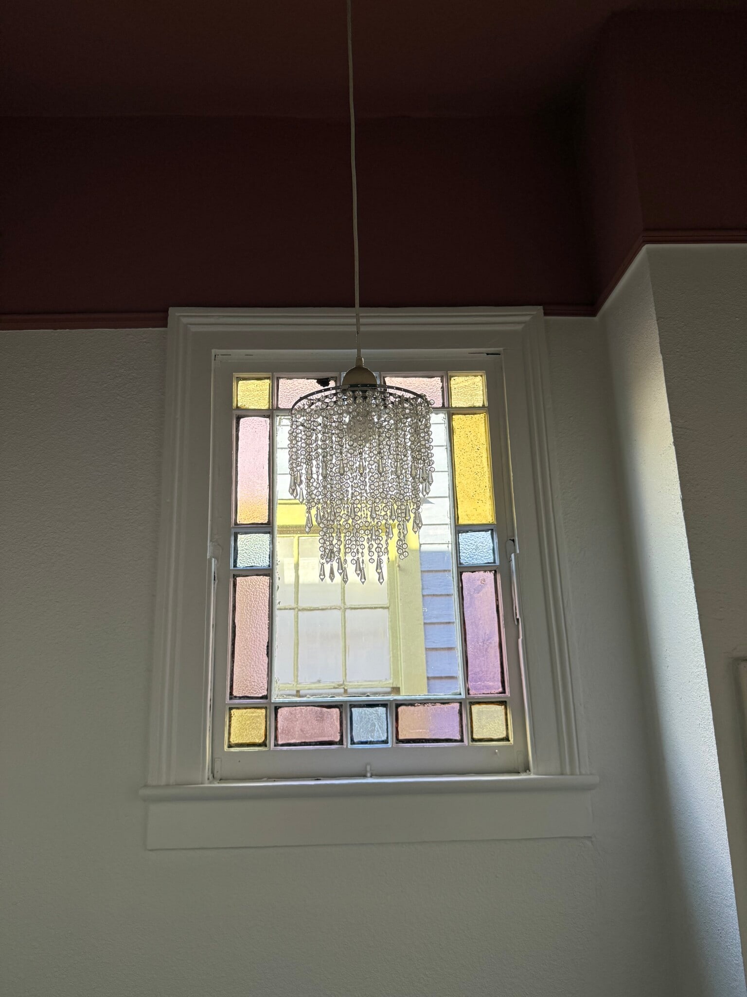 Stained glass window in bathroom - 440 S Rendon St