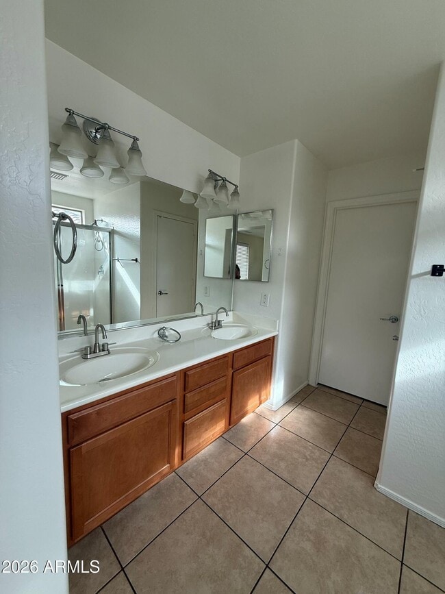 Building Photo - 8460 W Lewis Ave