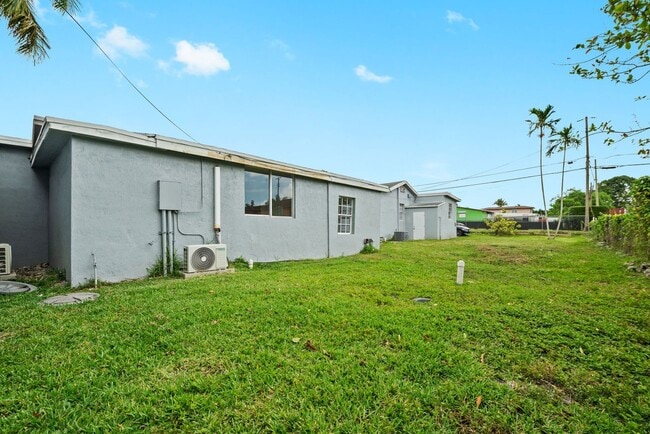 Building Photo - 10990 NW 18th Ave