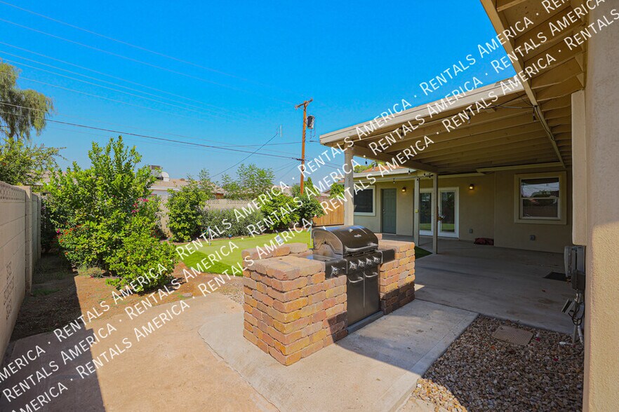 Building Photo - 8120 E Amelia Ave