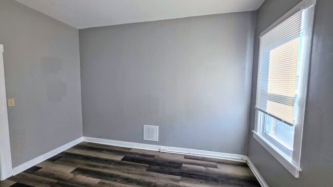 Building Photo - Beautiful Two Bedroom, Plus a Pass Through Room with a Fenced in Rear Patio