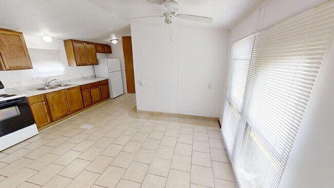 Building Photo - "Charming 3-Bed, 2-Bath Mobile Home Retrea...