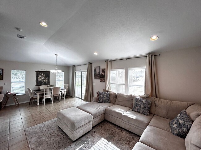 Building Photo - Newer Build 3/2 with Fenced in yard minute...
