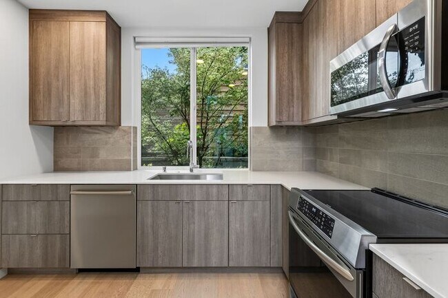 Building Photo - Air Conditioned Hilltop Gem w/ 360° Rooftop Ocean, Mountain and Skyline Views