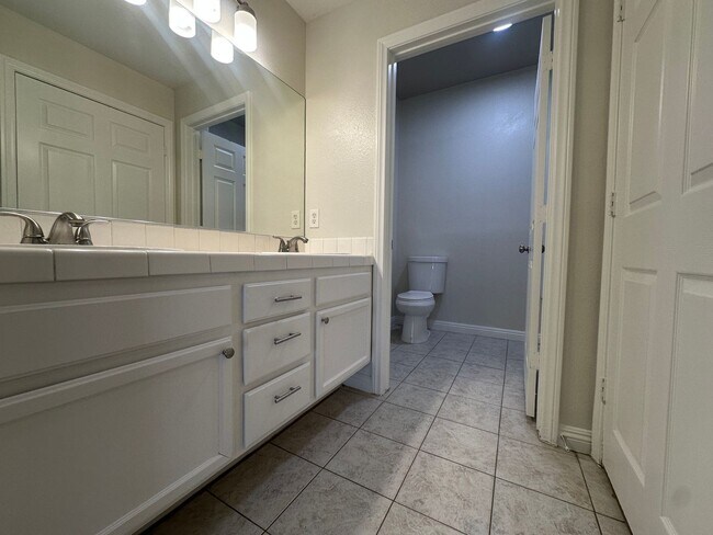 Building Photo - MUST SEE...2 bedroom, 2 bath condo ready for immediate move in