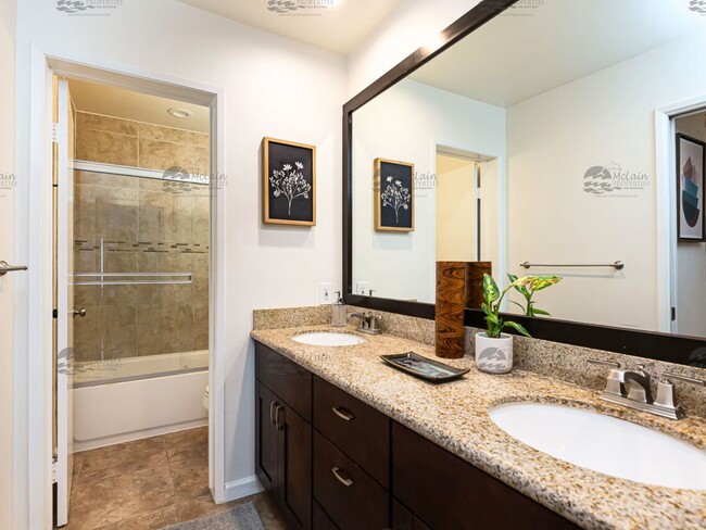 Building Photo - Top Floor Furnished Condo In The Heart Of ...