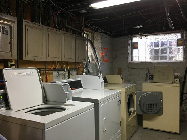 Coin laundry in basement - 103 Lancaster Ave
