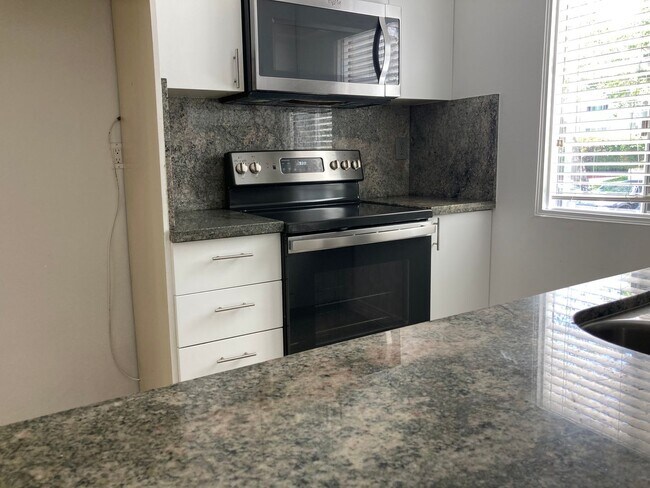 Building Photo - $3,295! Charming 2-Bed, 2-Bath Corner Unit in Gated Culver City Community!