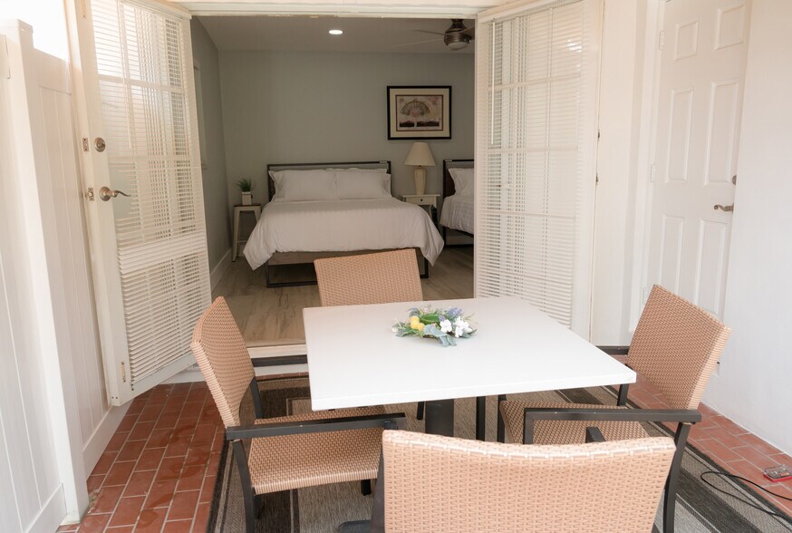Bedroom and Bathroom #3 - Opens to Covered Patio - 4540 NW 12th Dr