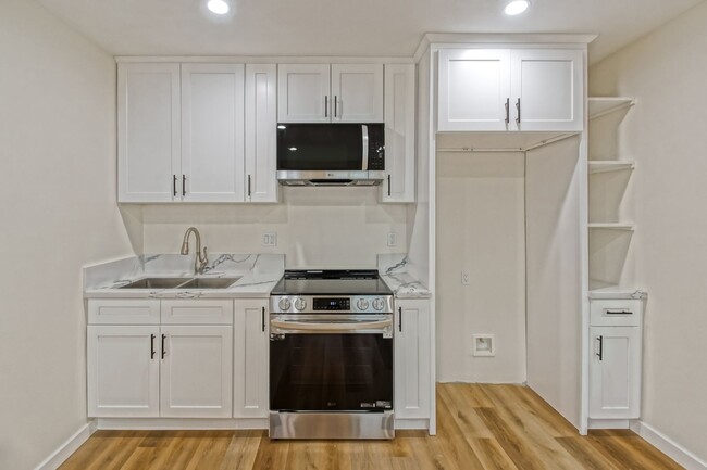 Building Photo - NEWLY BUILT, LUXURIOUS & BRIGHT, 1BR1BA AD...