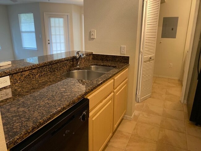 Building Photo - Welcome home to these beautifully Condo in...