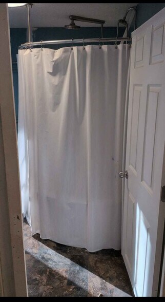 Corner bathtub and shower - 327 S Adams St