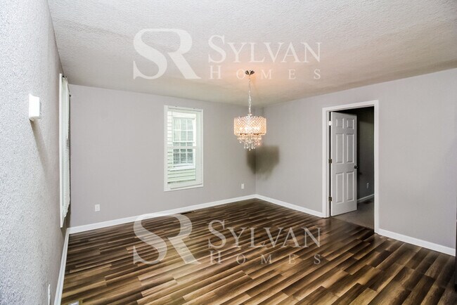 Building Photo - Turn the key. Enter. Smile. Repeat every day!