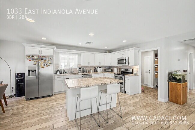 Building Photo - 1033 E Indianola Ave