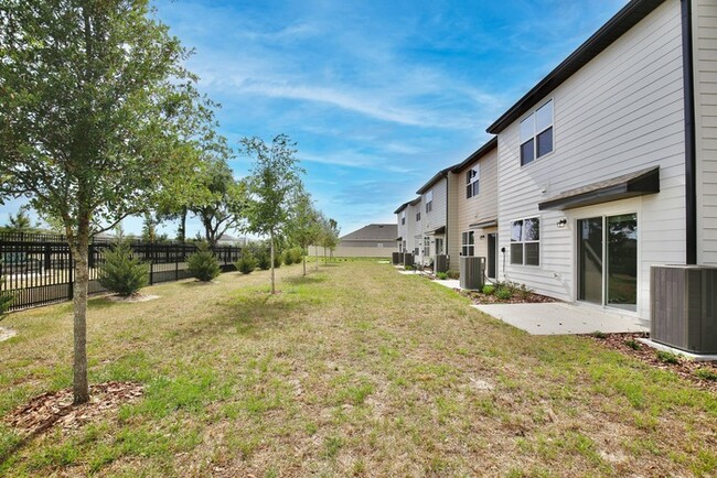 Building Photo - Brand New 3/2.5 Modern Townhome with 1 Car...