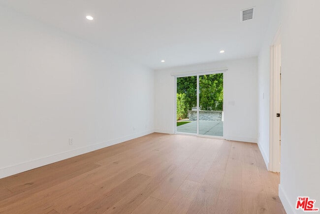 Building Photo - 5110 Garden Grove Ave