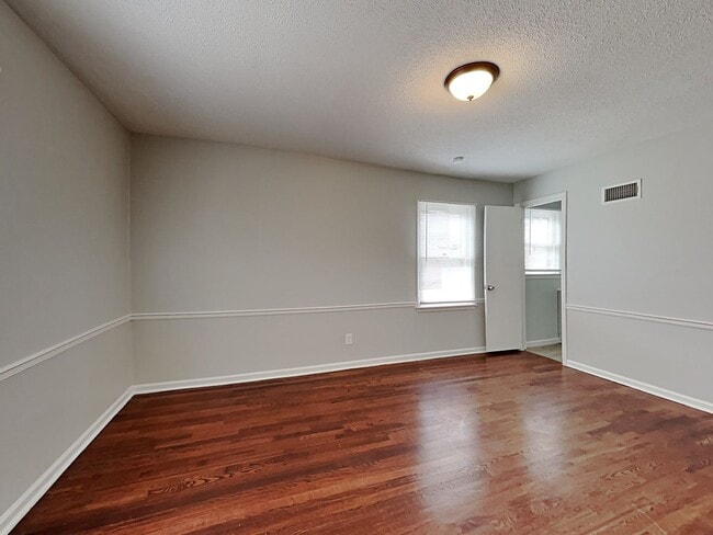 Building Photo - Spacious 4BR Home with Finished Basement, Fireplace & Unique Layout