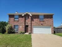 Building Photo - Welcome to your SPACIOUS 4/3/2 home in Man...