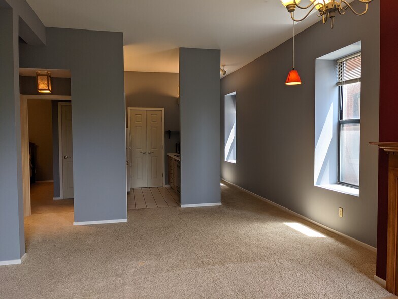View of the master bedroom, kitchen and entryway from the living room - 4496 Maryland Ave