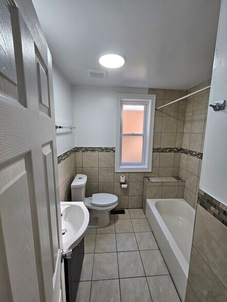 Building Photo - 8539 S Colfax Ave