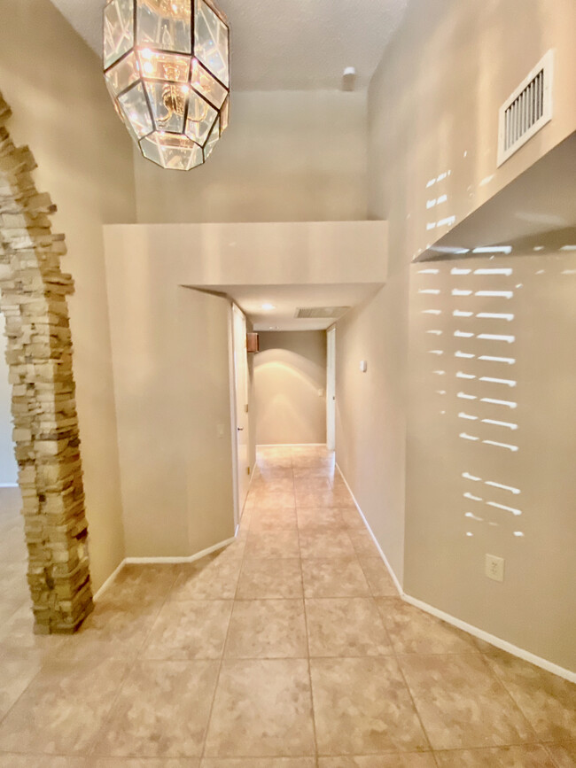 Elegant & bright entry foyer - 13722 W Elmbrook Dr