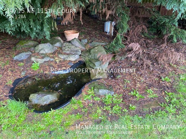 Building Photo - Ranch Style Brush Prairie Home with Large ...