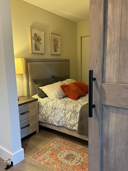 Den converted into bedroom with barn door - 1938 Jackson St