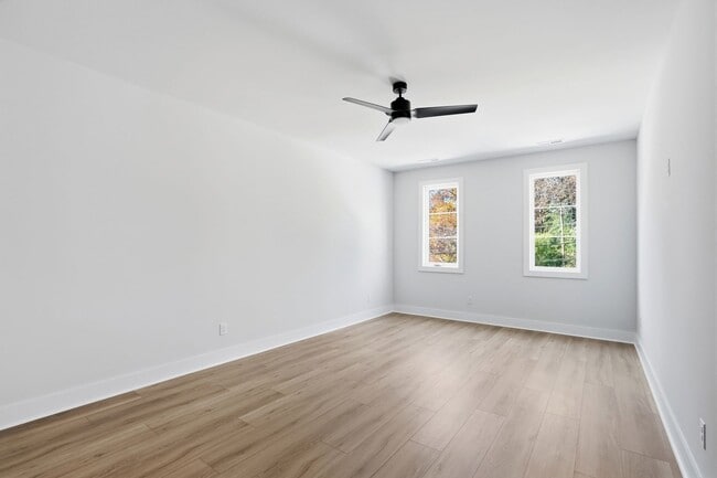 Building Photo - Bright, Open & Exceptionally Large—Your Ideal 2-Story Townhome