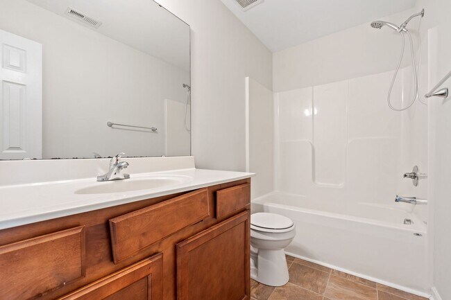 Building Photo - Duplex Rental Available in Garner – 4 Bed, 2.5 Bath with Garage & Private Backyard