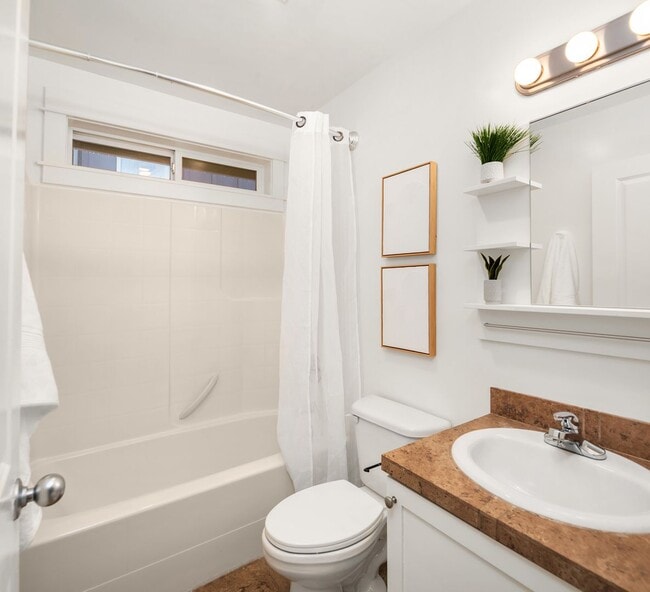 Building Photo - A Quiet Retreat with Parking, Patio, and City Proximity