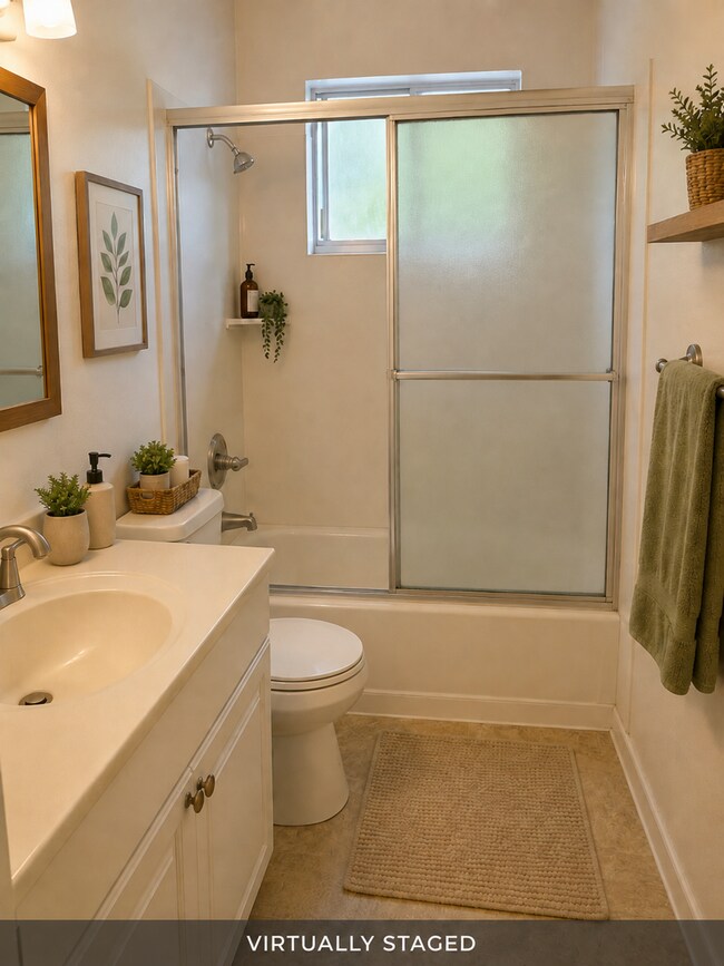 Building Photo - Updated 2 bedroom 1 bath condo in a quiet park like setting with a community pool